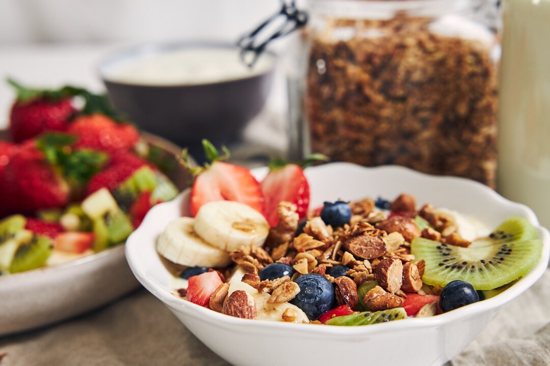 Healthy vegan breakfast with fruits and grains